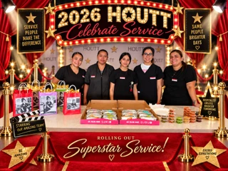The HOUTT team on a red-carpet, Hollywood-themed set at their 2026 Celebrate Service event